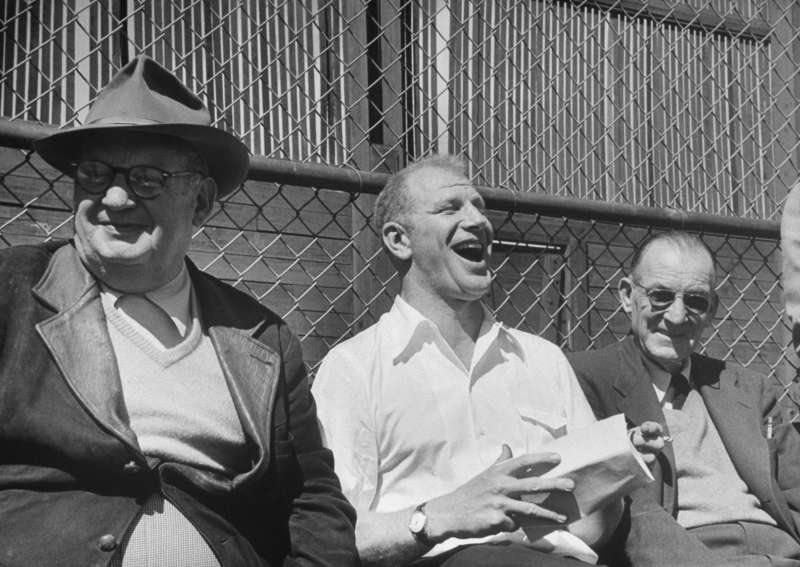 Bill Veeck (center) erupts in laughter reading a sports column picking his St. Louis Browns to finish in first place in the American League in 1952. Few people ever had more fun around baseball -- or brought more enjoyment to more baseball fans -- than the Chicago native. Owner, at various times, of the Indians, the Browns, and the Chicago White Sox, Veeck (rhymes with  wreck ) is remembered and still celebrated as a man who refused to take the game he loved -- or himself -- too seriously. Oh, and that 1952 season? The Browns finished seventh, 31 games out of first.