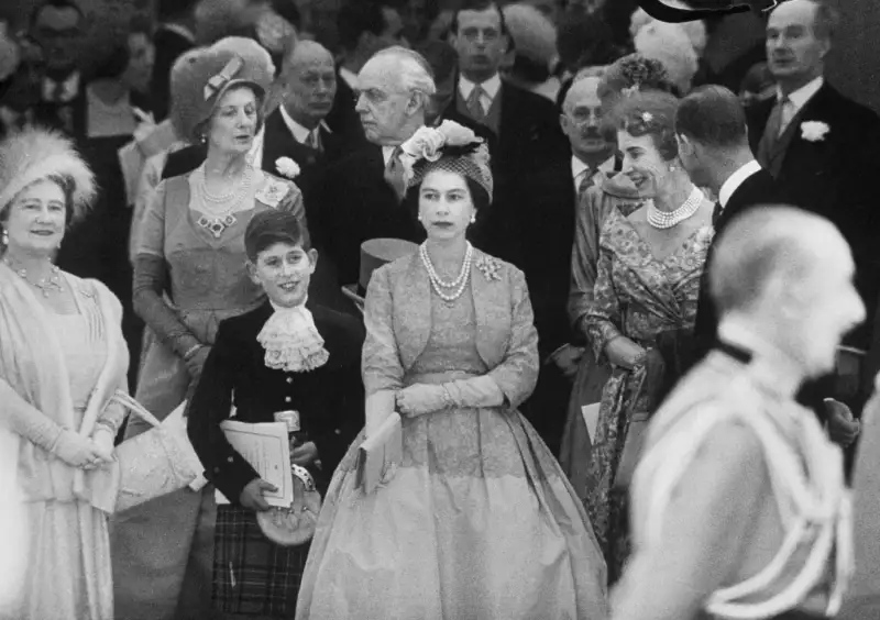The British, as weary and discouraged as the rest of the world in 1952, saw in their new young Queen a reminder of a great past when they had carved out empires under Elizabeth I and Victoria, and dared to hope that she might be an omen of a great future. Her dramatic flight from a vacation in Kenya at George VI's death to take her place at the head of the royal family beside the Queen Mother and revered Queen Mary gave the British spirit a lift even in the midst of their bereavement. —