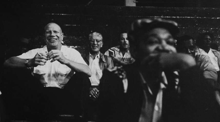 White Sox owner Bill Veeck watches his team win a game.  Baseball is almost the only orderly thing in a very unorderly world,  he once said.  If you get three strikes, even the best lawyer in the world can't get you off.