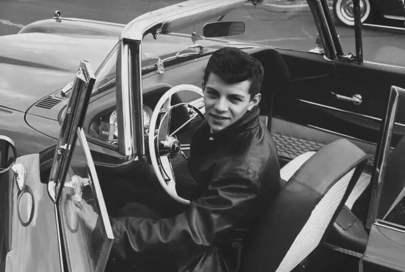 Frankie Avalon shows off his Pontiac convertible.