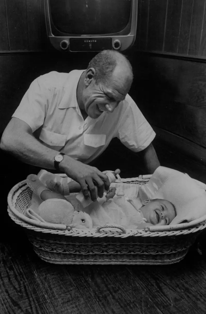 Veeck feeds his baby -- one of eight kids he had over the course of two marriages. I was in the game for love, he once said of his years in baseball. After all, where else can an old-timer with one leg, who can't hear or see, live like a king while doing the only thing I wanted to do?