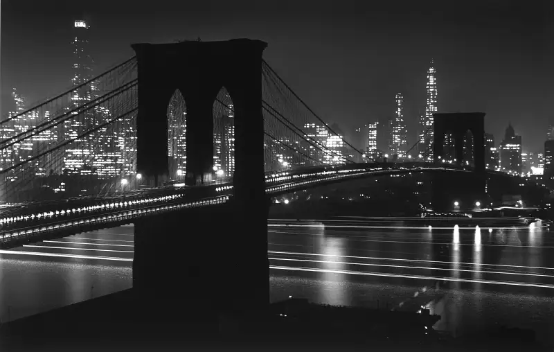 ... immaculate sigh of stars / Beading thy path, condense eternity / And we have seen night lifted in thine arms. — Hart Crane, To Brooklyn Bridge