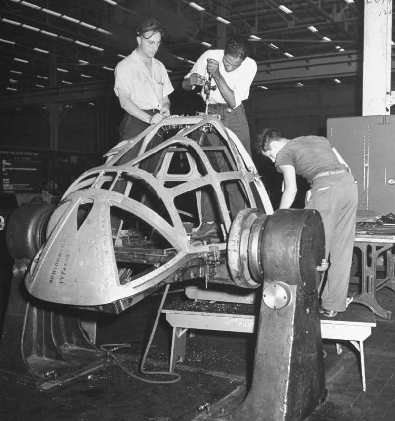 Ford aviation workers build a B-24 heavy bomber at the mammoth Willow Run plant in Michigan.
