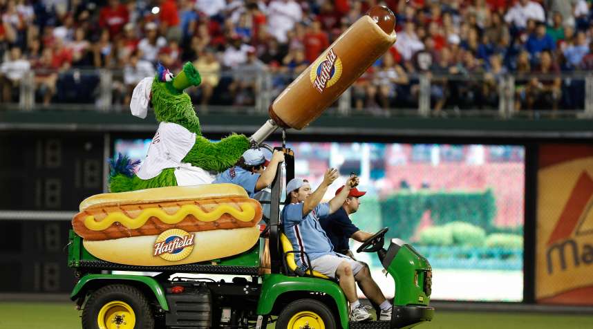 The Philadelphia Phillies mascot the Phillie Phanatic shoots a Hatfield Hot Dog into the stands at Citizens Bank Park.