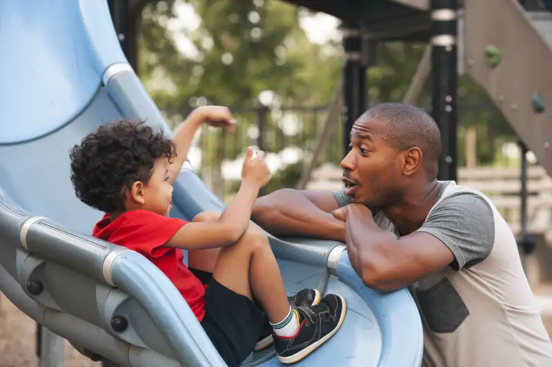 Father and son at the playground