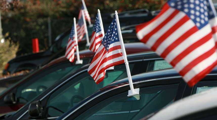 American flags are seen on cars for sale at Santa Rosa Chevrolet December 12, 2008 in Santa Rosa, California.