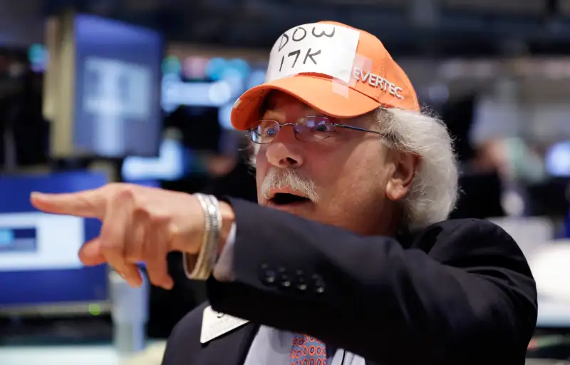 Trader Peter Tuchman jokes with a handmade  Dow 17,000  cap