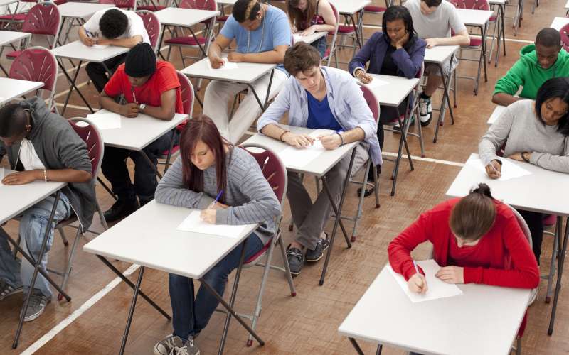 Students taking test in classroom