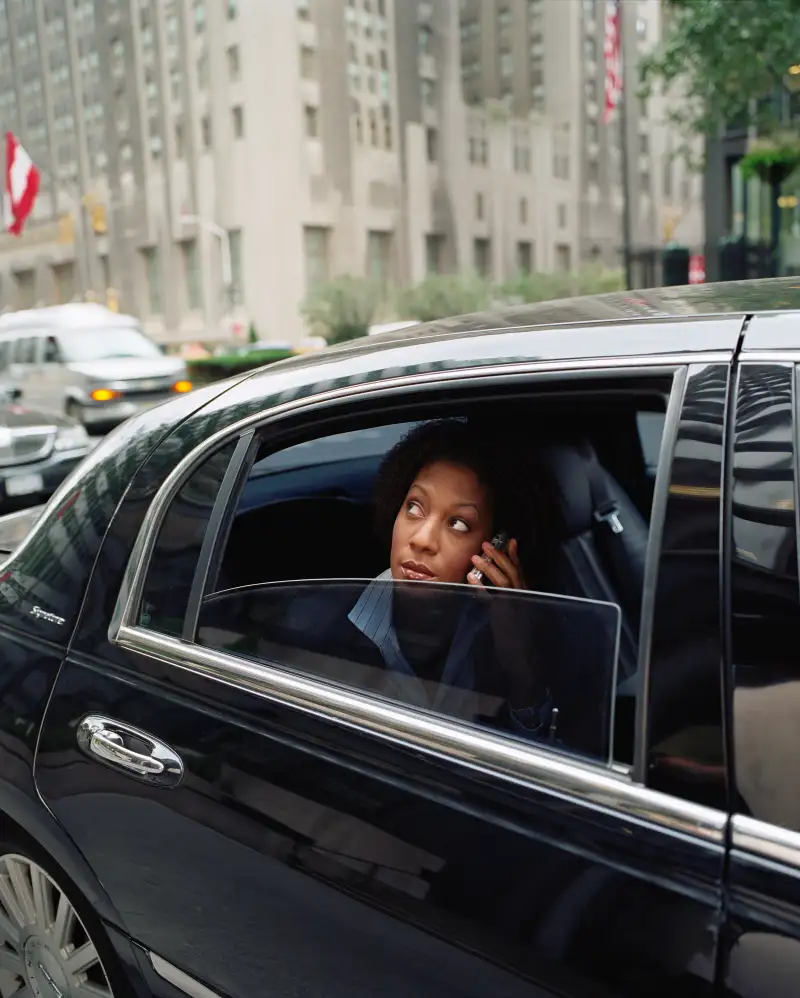 Businesswomen in a black car