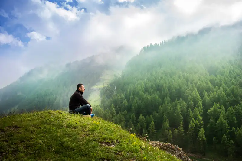 Man alone in the mountains