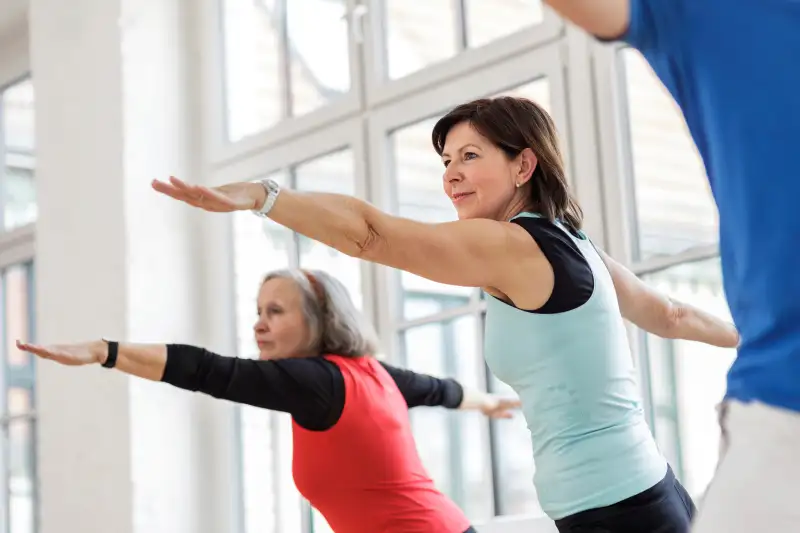 Women practicing yoga