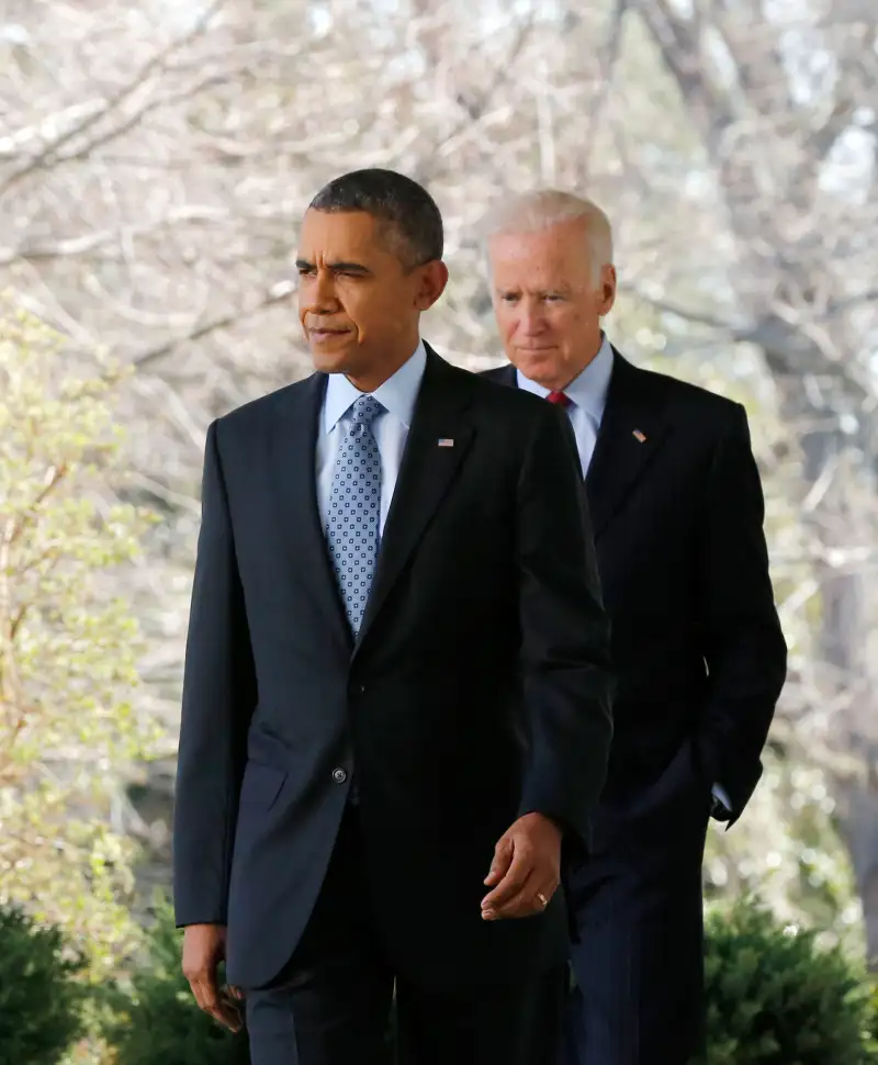 U.S. President Barack Obama (L) walks out next to Vice President Joseph Biden.