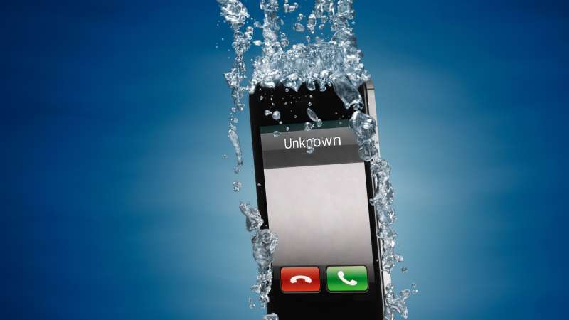 iPhone submerged in water