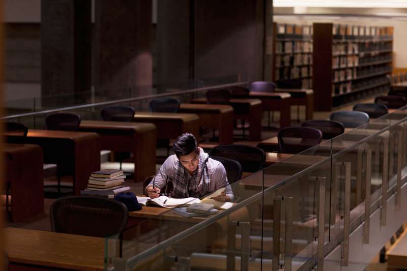 Student in library late at night
