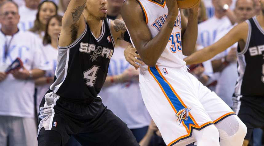 Kevin Durant (#35) of the Oklahoma City Thunder backs up to the basket against the San Antonio Spurs in Game 6 of the Western Conference Finals during the 2014 NBA Playoffs at the Chesapeake Arena on May 31, 2014 in Oklahoma City, Oklahoma.