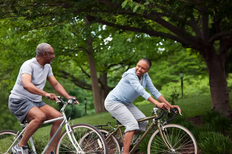 Senior couple riding bicycles