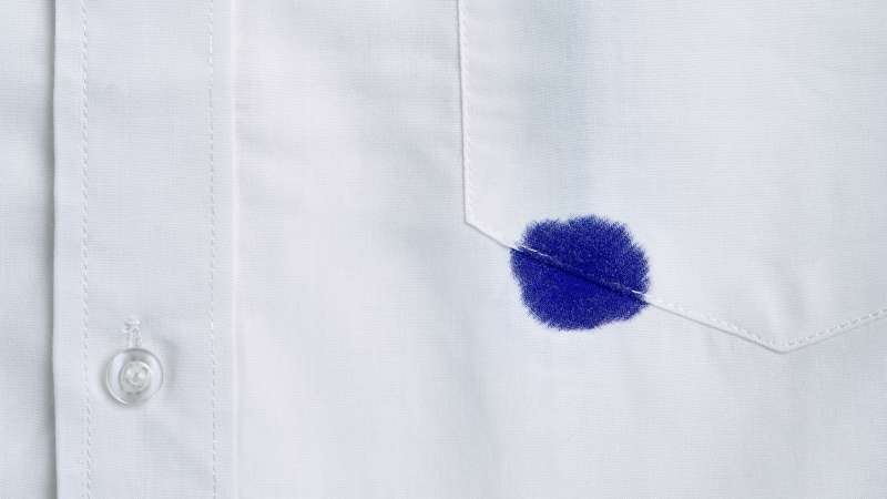 pen stain on white business shirt
