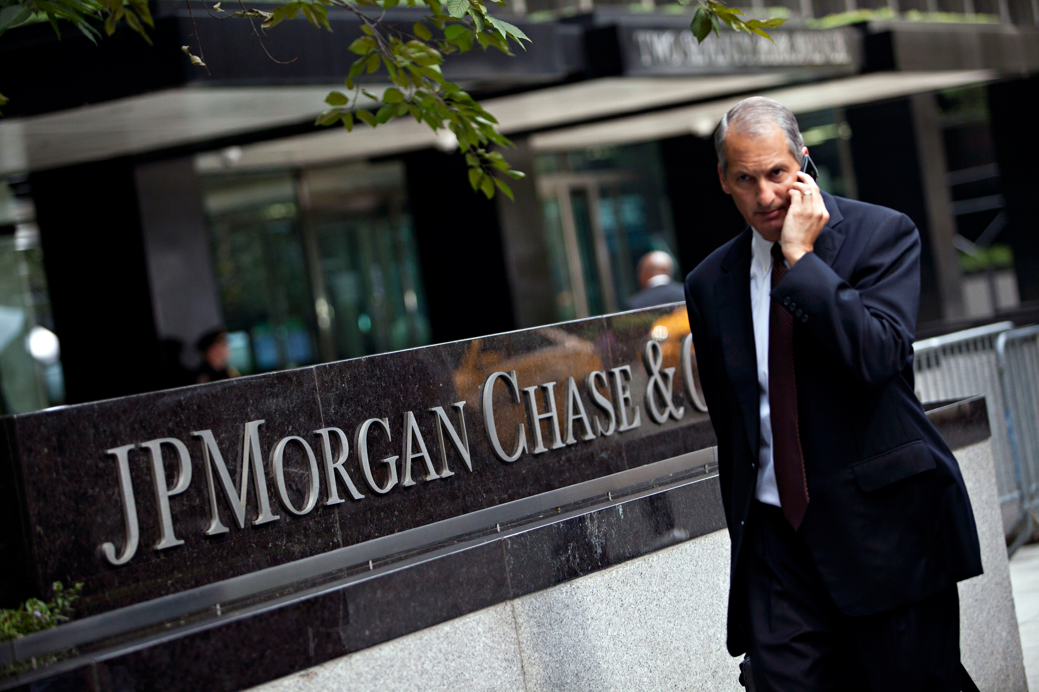 A man walks past JP Morgan Chase's international headquarters on Park Avenue in New York.