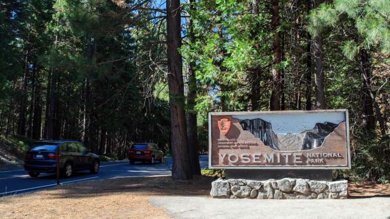 Entrance sign near Big Oak Flat Entrance Station, Yosemite National Park.