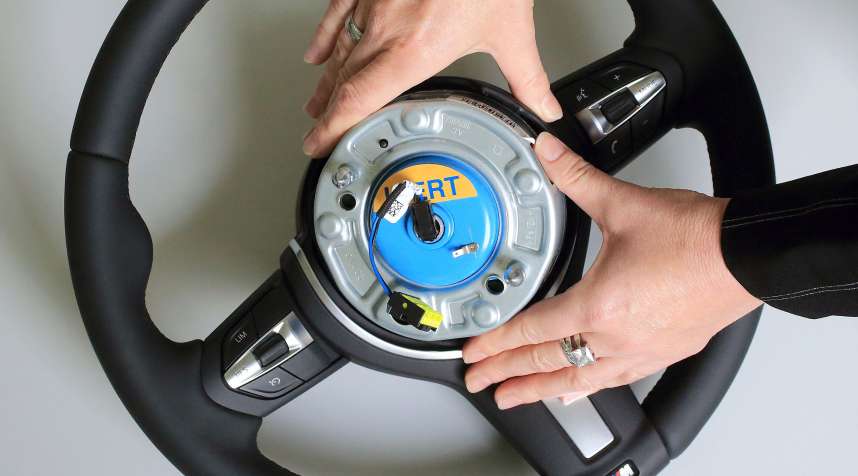 An airbag igniter being installed at a Takata factory in Schoenebeck, Germany