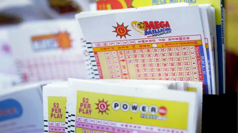 Lottery forms on a gas station counter in Lutherville-Timonium, Maryland, Thursday, Dec. 12, 2013.