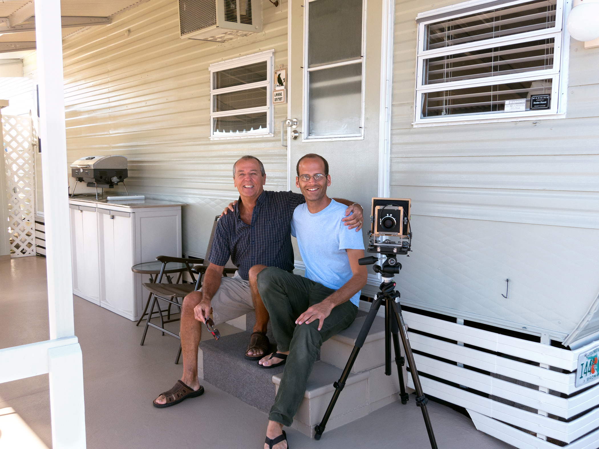 Mika Goodfriend (right) with his 4x5 camera and Fernand, Breezy Hill, FL.