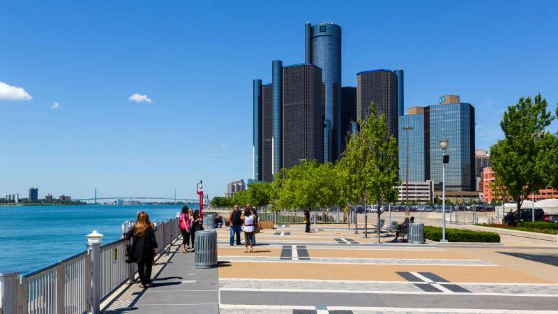 The Renaissance Center city skyline and the Detroit River viewed from Milliken State Park, Detroit, Michigan.