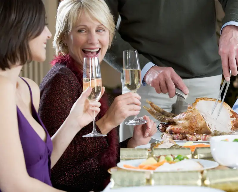 mother and daughter at thanksgiving table
