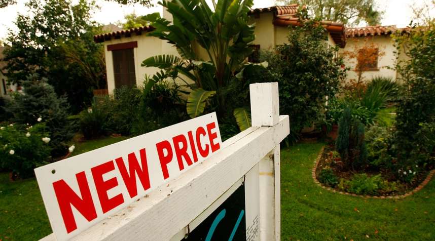 GLENDALE, CA - NOVEMBER 27:  A reduced price sign sits in front of a house November 27, 2007 in Glendale, California. U.S. home prices plummeted 4.5 percent in the third quarter from the year before. It is the biggest drop since the start of Standard &amp; Poor’s nationwide housing index 20 years ago, the research group announced. Prices also fell 1.7 percent from the previous three-month period in the largest quarter-to-quarter decline in the index’s history.    (Photo by David McNew/Getty Images)
