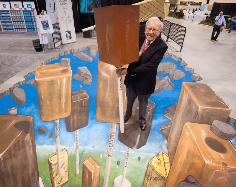 Berkshire Hathaway's Warren Buffett at the See's Candies booth Saturday, May 3, 2014, at the Berkshire Hathaway Annual Shareholder's Meeting, in Omaha, Neb.