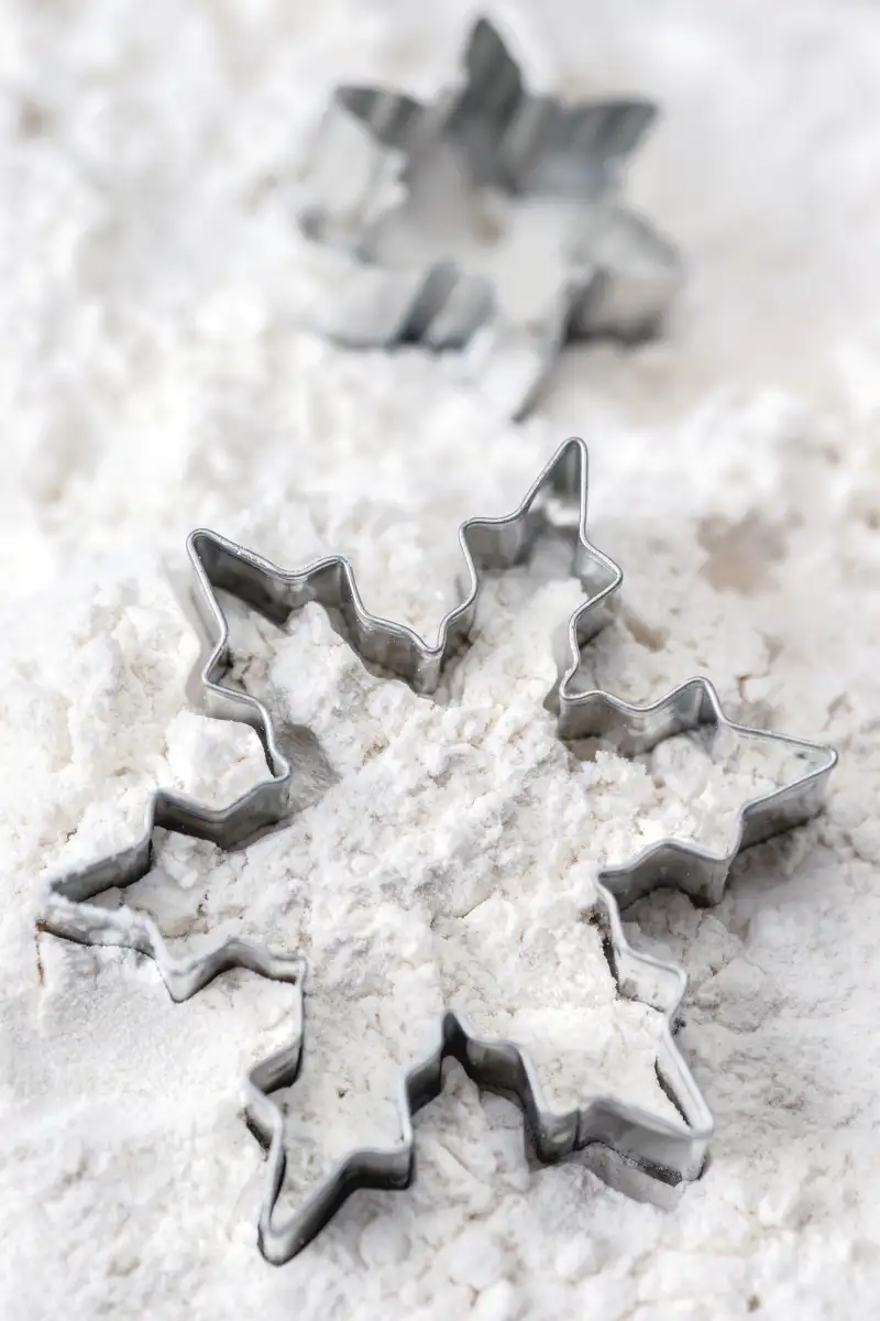 snowflake cookie cutter in flour