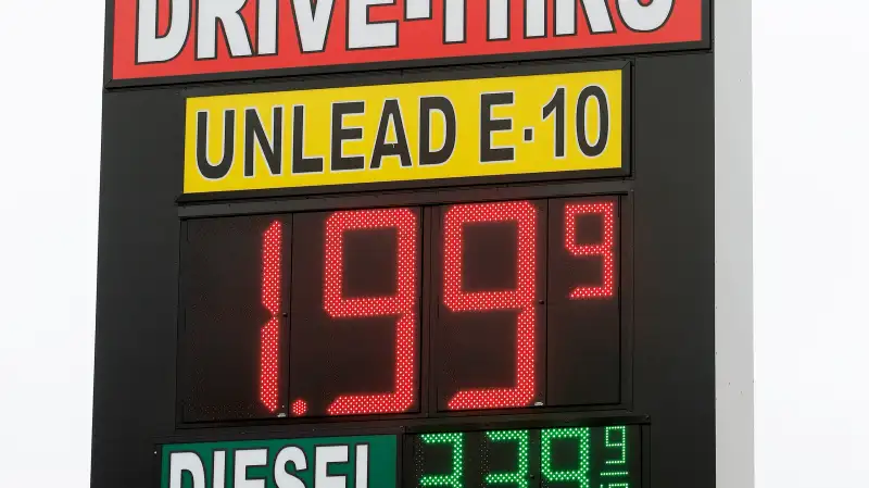 A sign displays the price for E-10 gasoline for $1.99 at the OnCue convenience store and gas station, Wednesday, Dec. 3, 2014, in Oklahoma City.