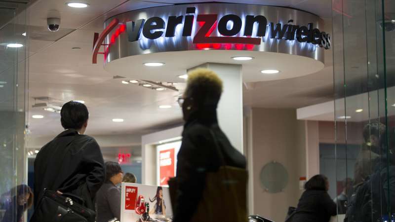 A customer walks into a Verizon Wireless retail store in Washington, D.C., U.S., on Thursday, Oct. 23, 2014.
