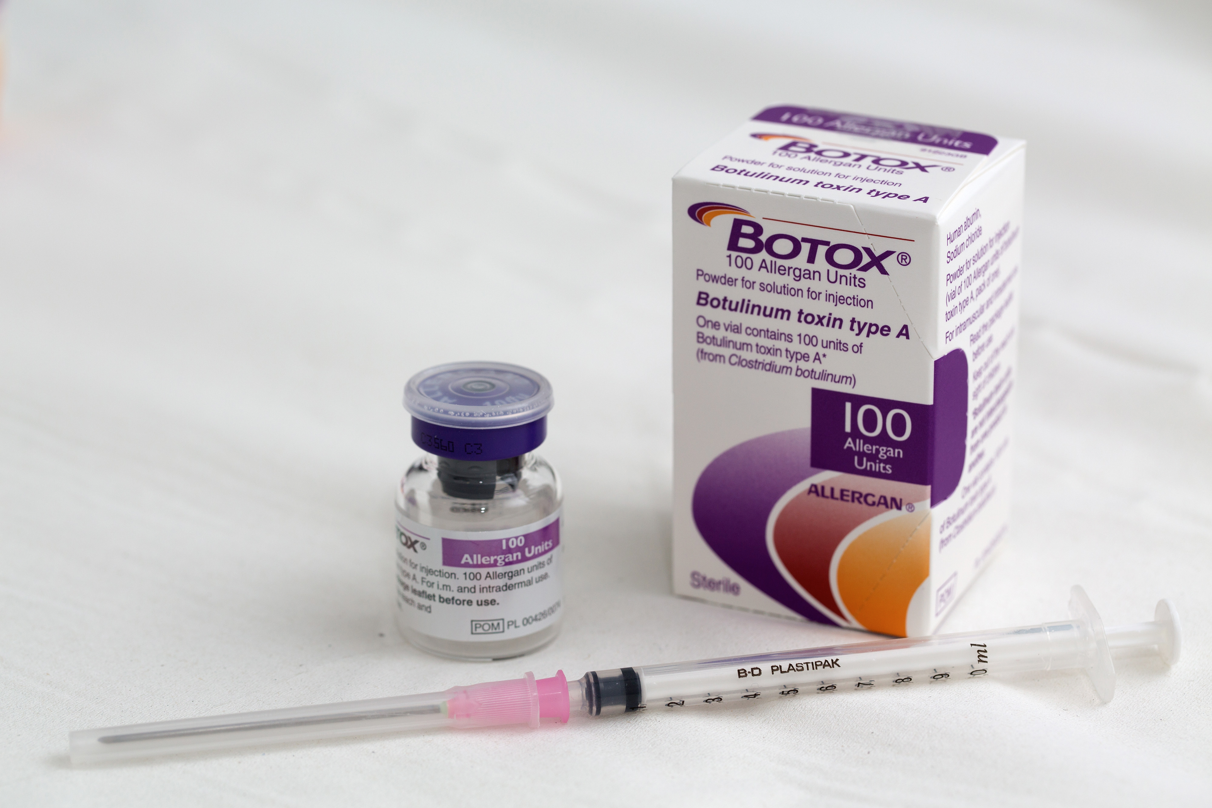 A syringe rests alongside a vial of Allergan Botox, produced by Allergan Inc.
