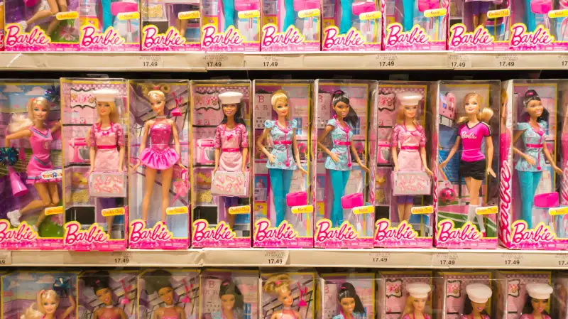 Barbies on shelves