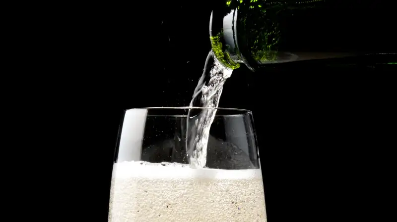 pouring champagne