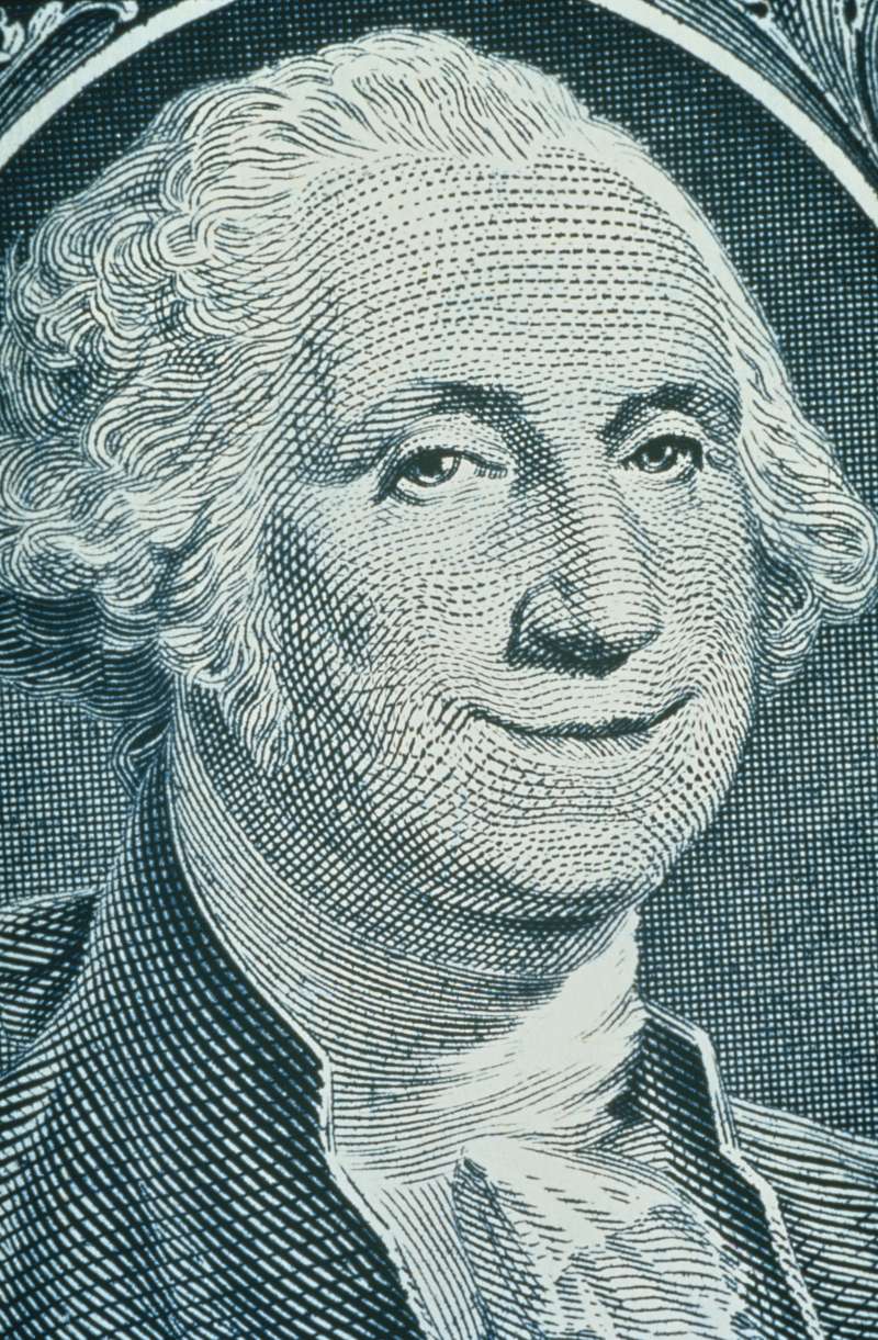 Smiling George Washington on dollar bill