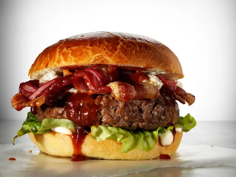 When it comes to having enough money in retirement, a greasy burger may be worse for your finances than a bear market.