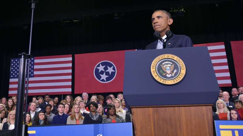 US President Barack Obama speaks on new proposals for higher education accessibility at Pellissippi State Community College in Knoxville, Tennessee on January 9, 2015. Looking on are US Vice President Joe Biden and his wife Jill Biden.