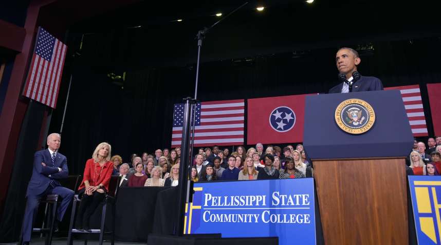 US President Barack Obama speaks on new proposals for higher education accessibility at Pellissippi State Community College in Knoxville, Tennessee on January 9, 2015. Looking on are US Vice President Joe Biden and his wife Jill Biden.