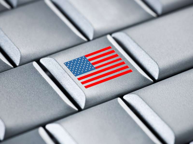 American flag graphic on laptop computer key