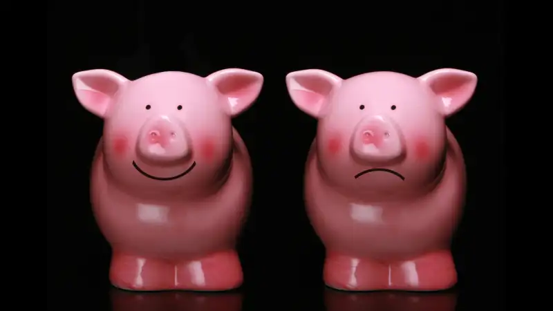 happy and sad piggy banks