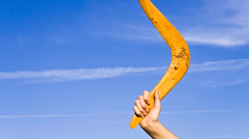 hand holding boomerang