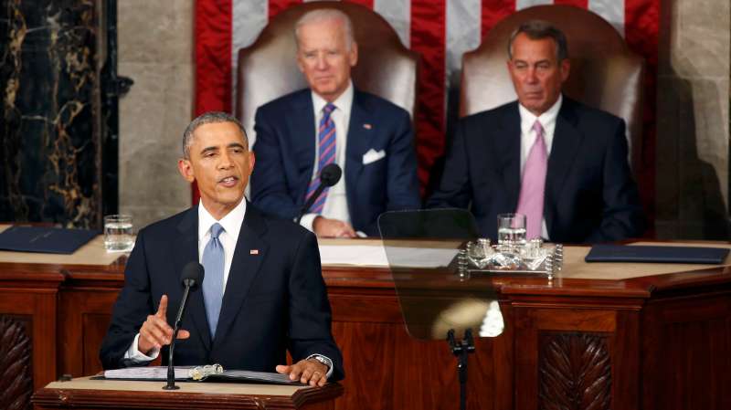 U.S. Vice President Joe Biden and Speaker of the House John Boehner watch as U.S. President Barack Obama delivers his State of the Union address to a joint session of the U.S. Congress on Capitol Hill in Washington on Jan. 20, 2015.