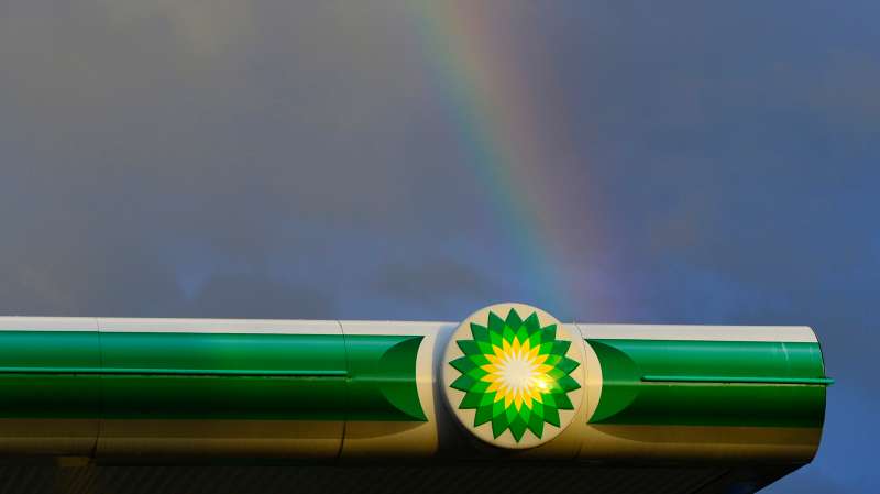 BP gas station with rainbow in the background