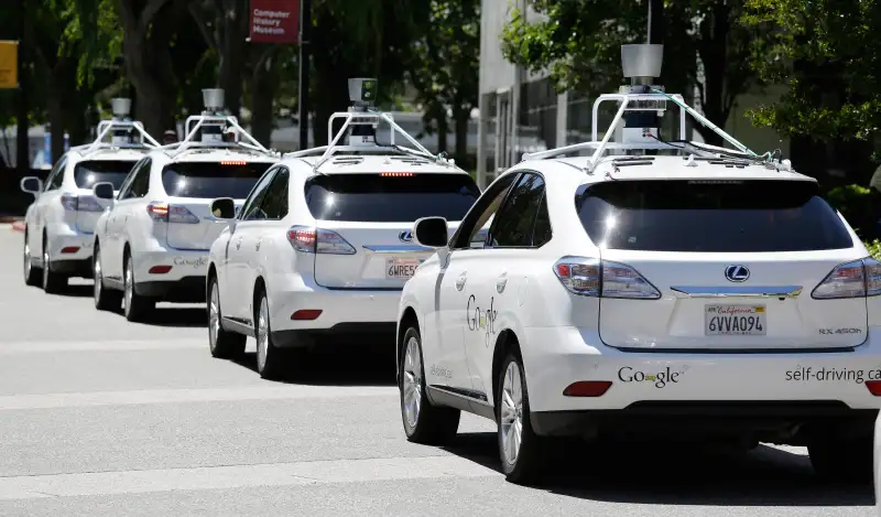 A row of Google self-driving cars in Mountain View, California