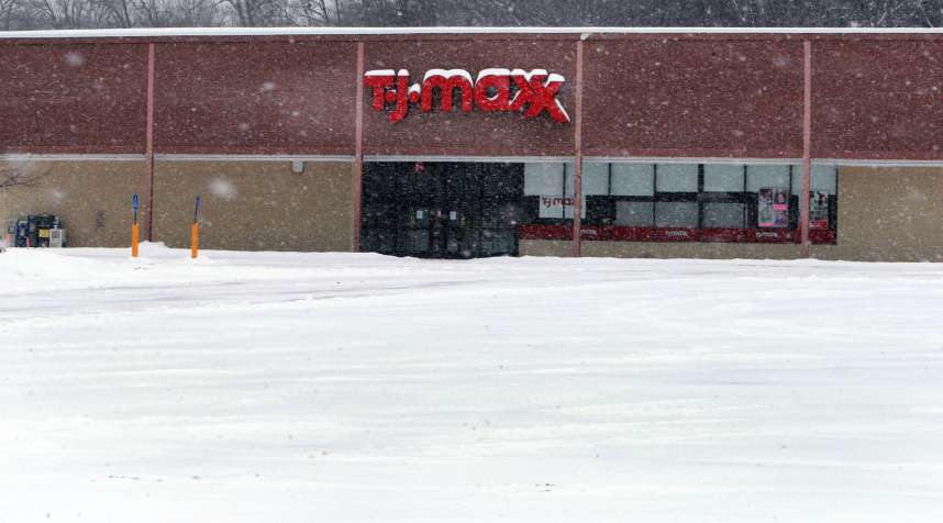 The Northeast was hit once again by snow, and some businesses such as this T.J. Maxx store in North Andover, Mass., were closed, February 9, 2015.