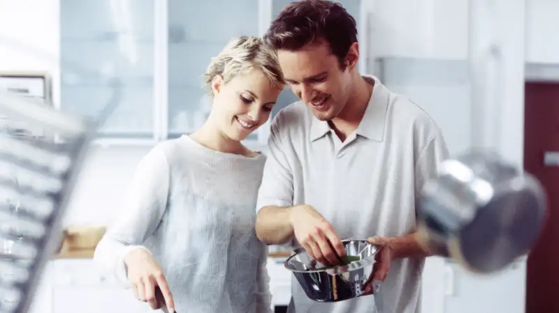 Couple cooking together