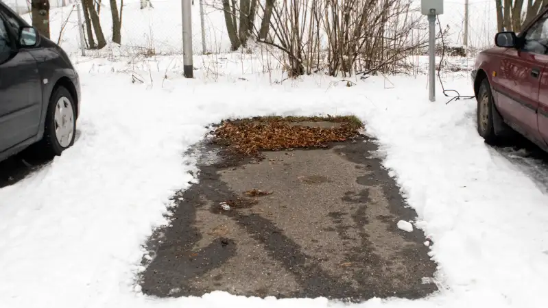 empty parking space and snow