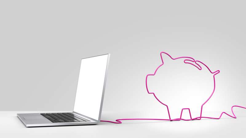 laptop with cord in shape of piggy bank